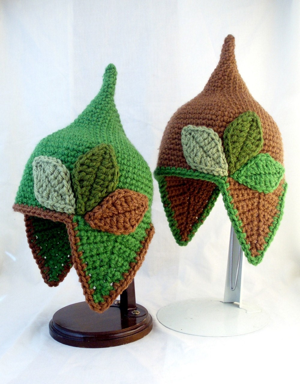 Pointed Green Baby Hat with Earflaps and Varying Green and Brown Leaves