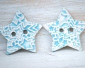 Fresh Star Buttons a pair of handmade ceramic buttons in turquoise Blue