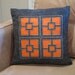 cut out Parker orange pillow, recycled plastic bottle felt
