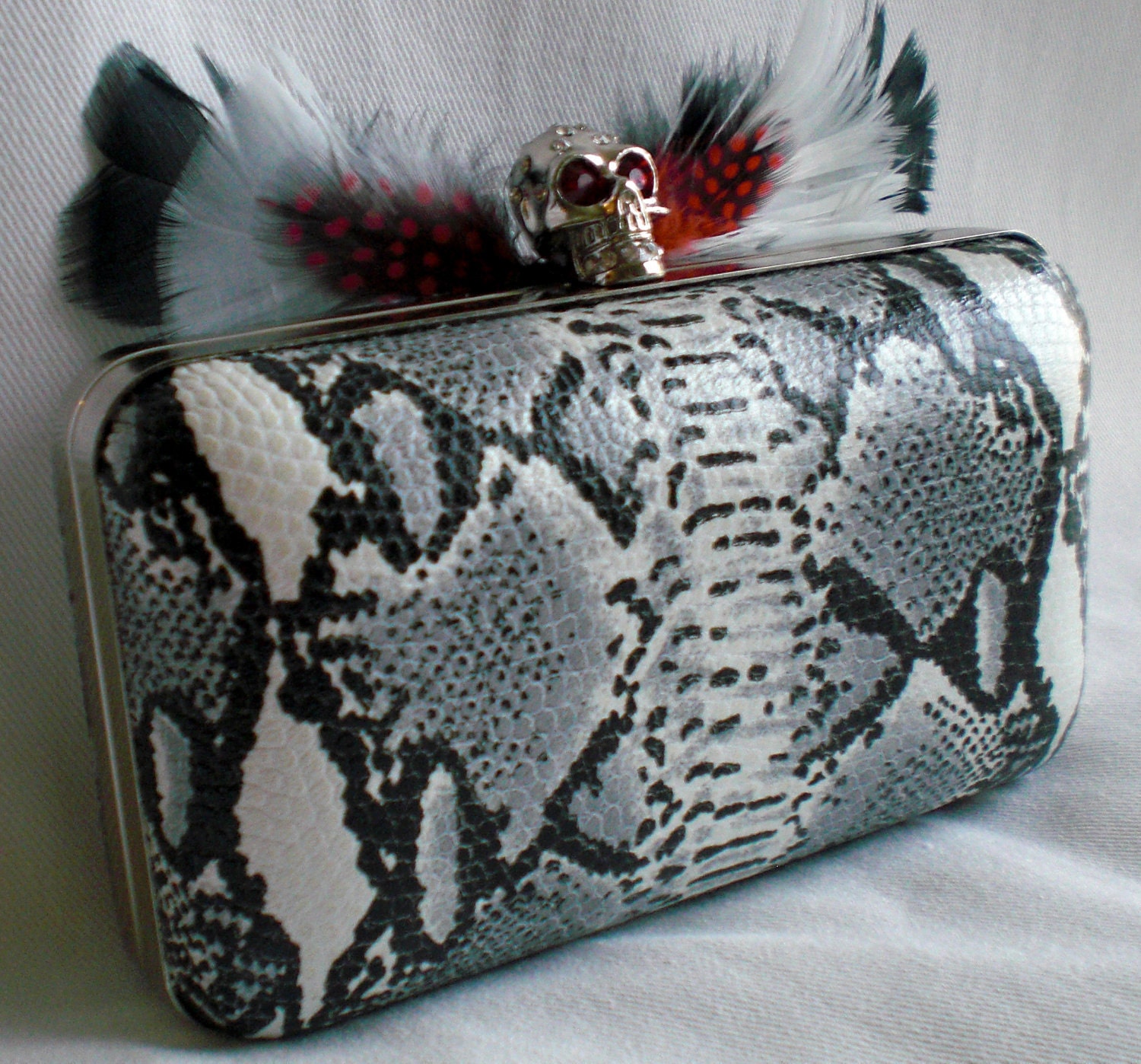 Skull Clutch with Snake Print leather and Feathers