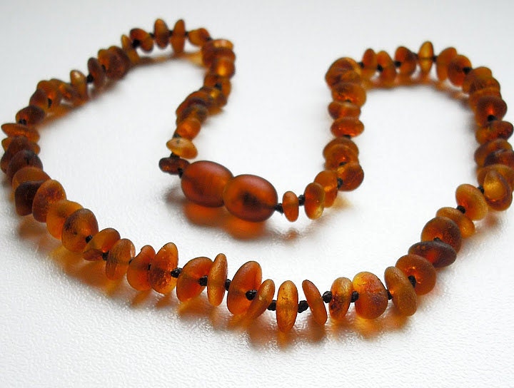 Maximum Effective Unpolished Baltic Amber Baby Teething Necklace. Dark Honey colour.