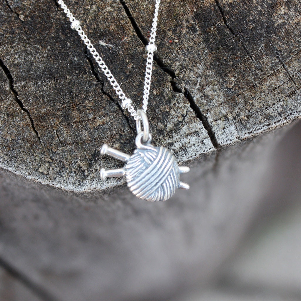 Knitting necklace - sterling silver knitting charm . ball of yarn and knitting needles . i love knitting