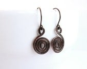 Copper tribal earrings Patinated oxidized swirl, Celtic, ethnic, minimalistic, rustic, hypoallergenic