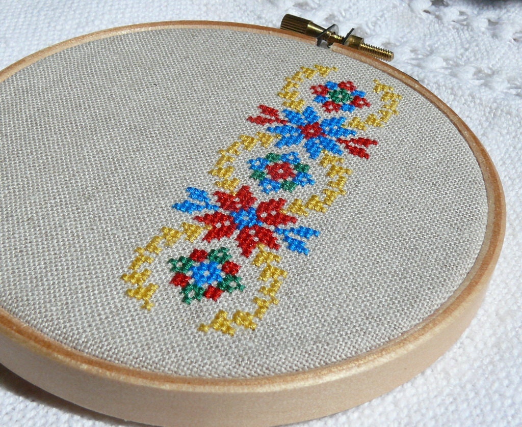 Ukrainian ornament hand embroidery cross stitch in wooden hoop