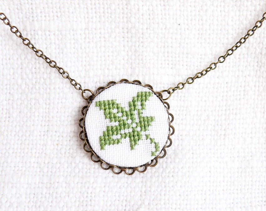 Hand embroidered necklace Leaf on white in bronze