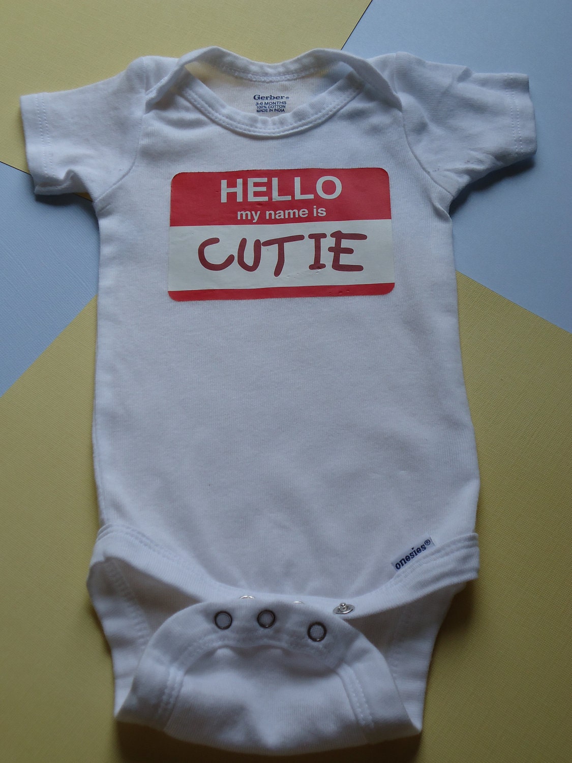 HELLO my name is CUTIE unisex baby onesie