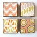 Scallop Pattern Orange 5x5 art block on wood Green Gray Green fish scales shapes red tile studio