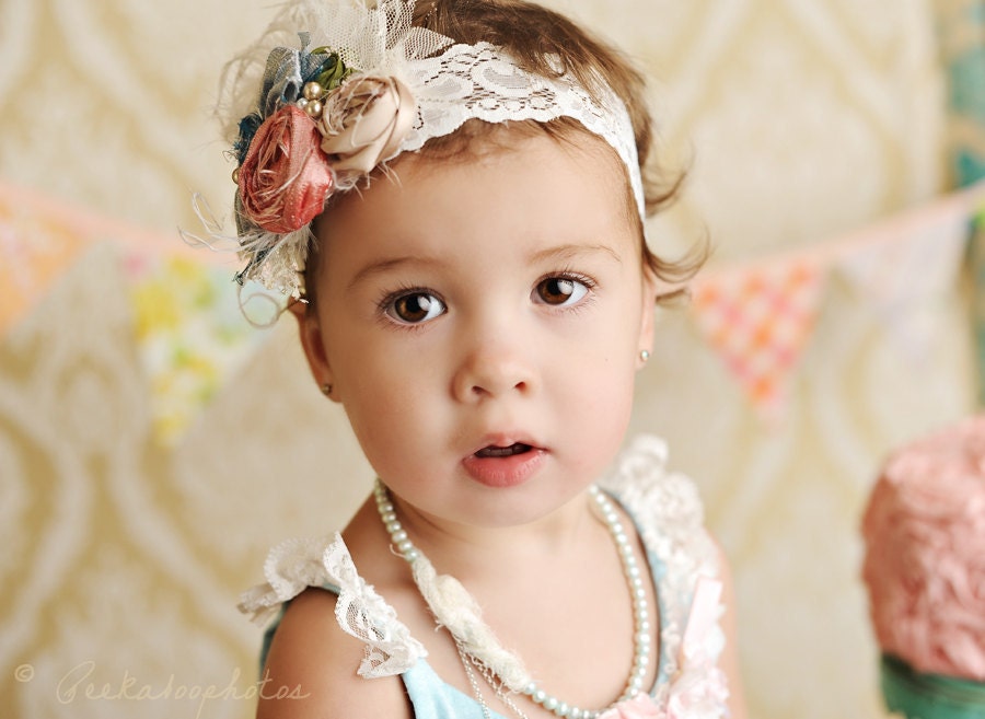 mademoiselle silk bow rosette headband with feathers