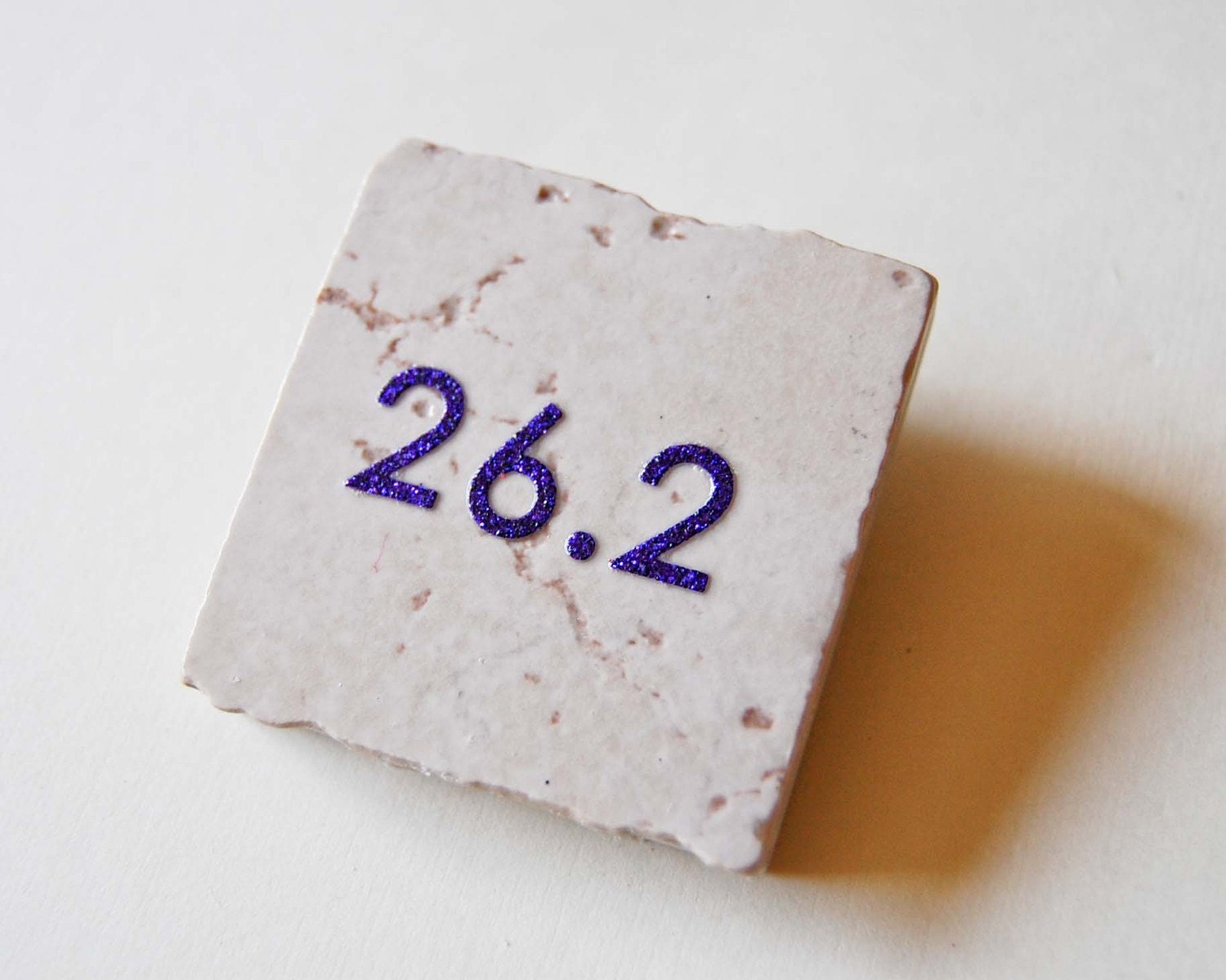 Marathon Purple 26 point 2 Tile Magnet