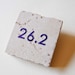 Marathon Purple 26 point 2 Tile Magnet
