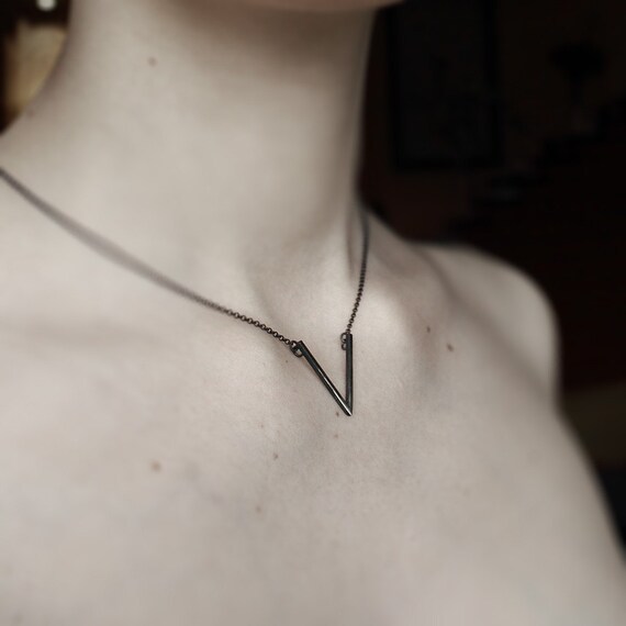V . oxidized sterling silver necklace with oxidized pendant