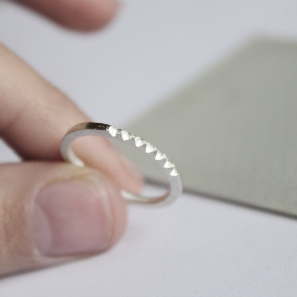 Pyramid row . sterling silver tiny studs ring