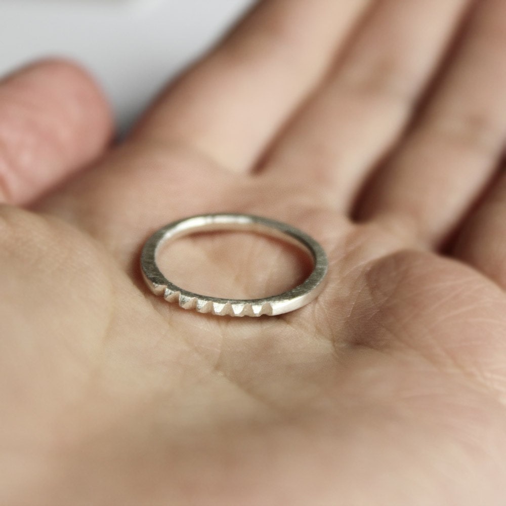 Pyramid row . sterling silver tiny studs ring