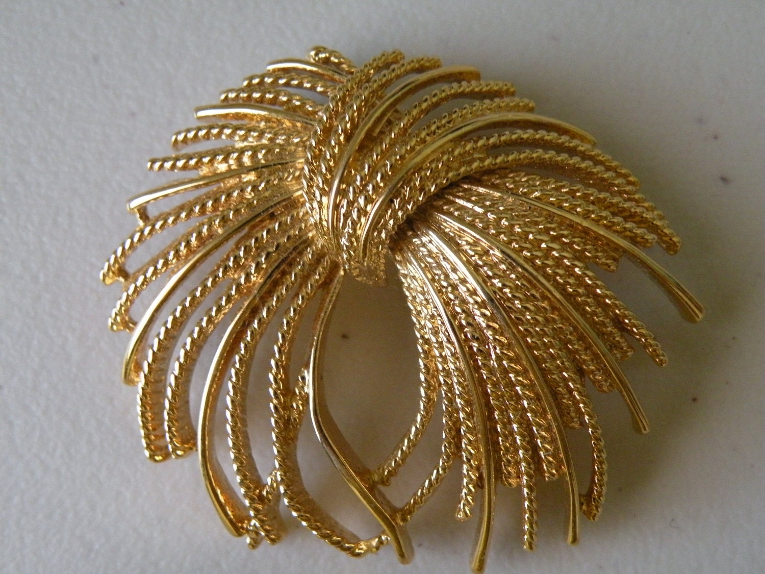 MONET gold plate firework brooch pin.