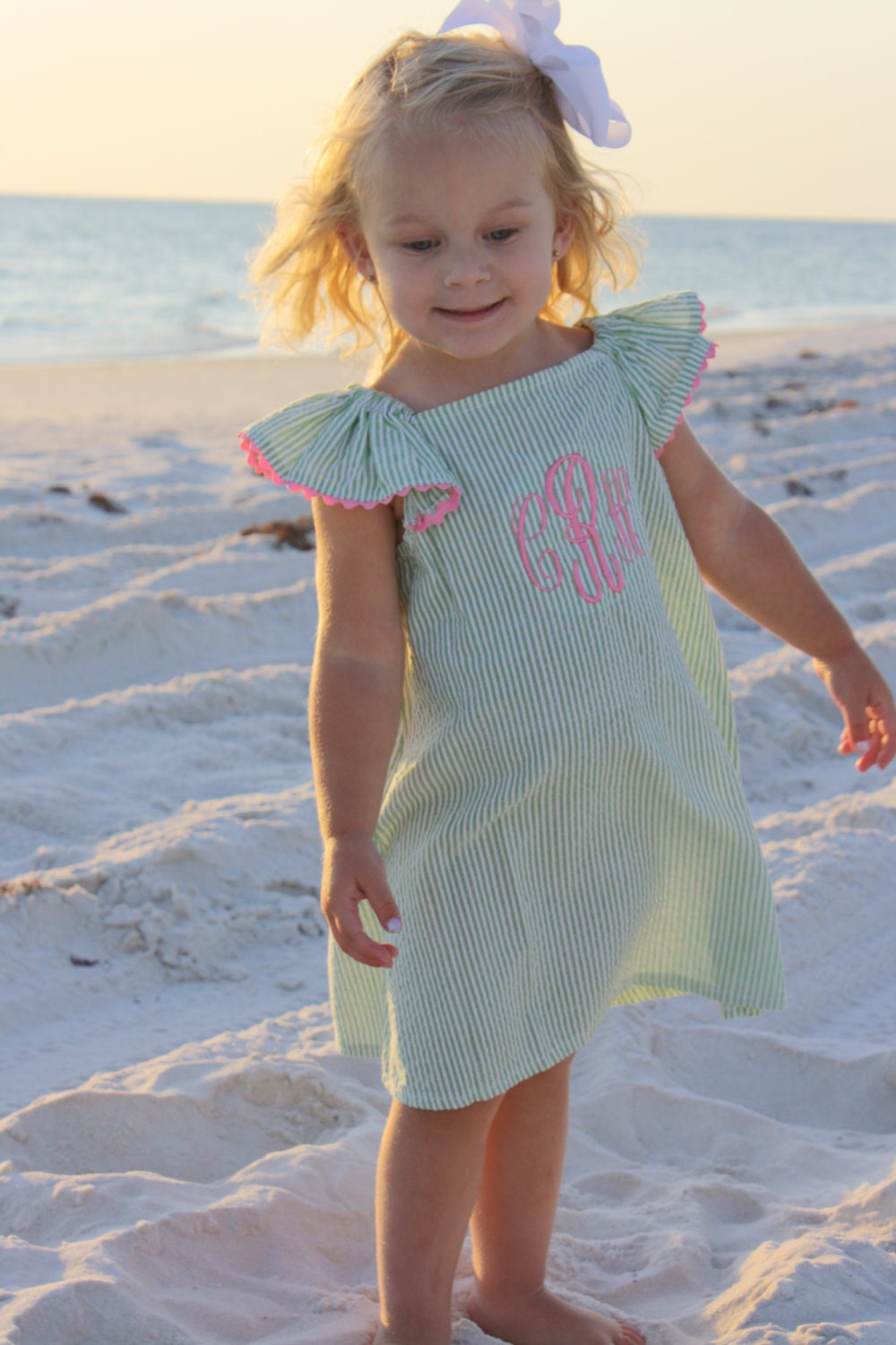 Green seersucker dress with pink ric rac and monogram