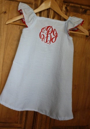 Blue seersucker dress with red ric rac and monogram