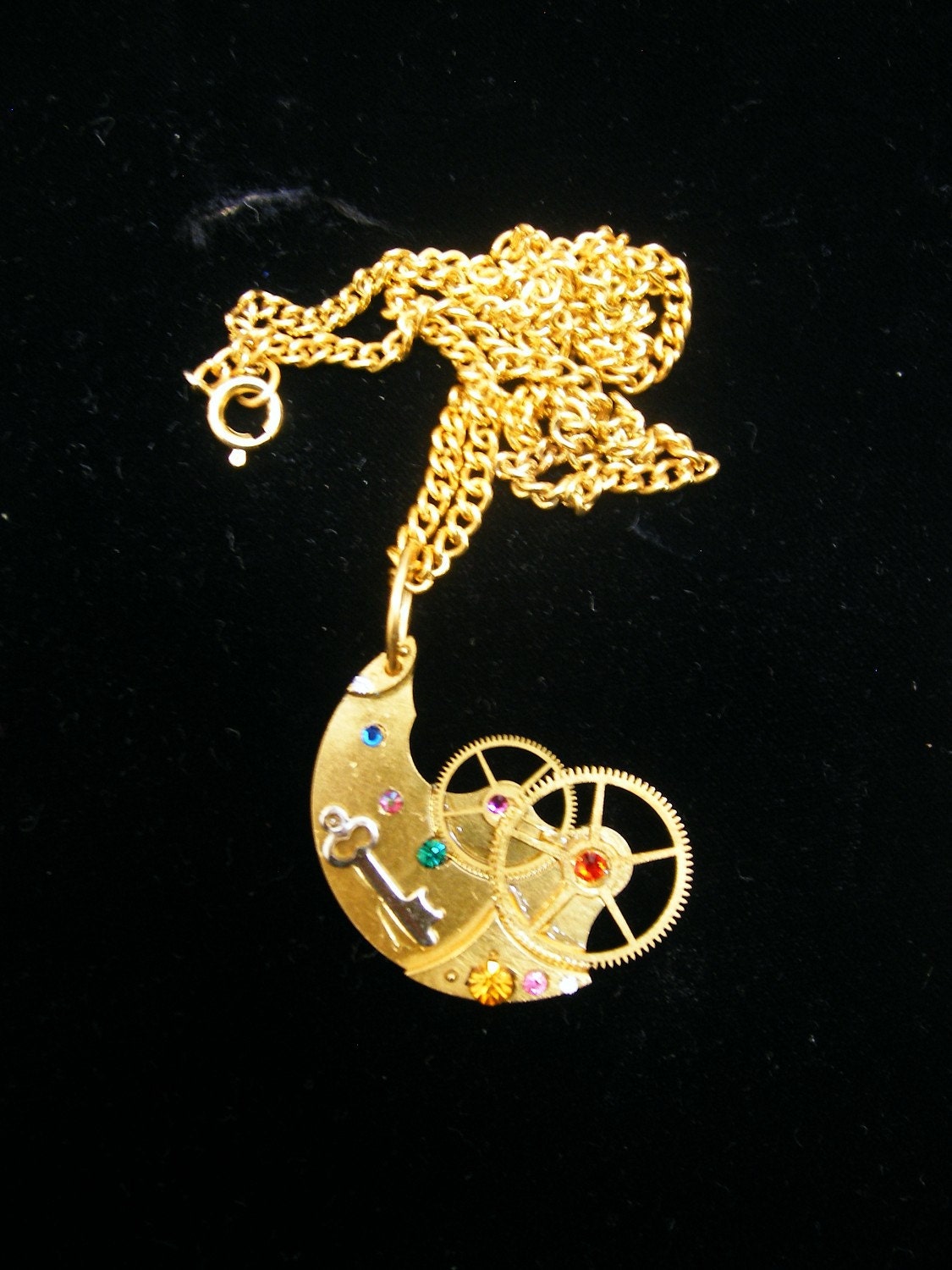 Clock work moon...Swarovski encrusted OOAK Steampunk time piece pendant on vintage brass chain