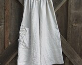 linen pant in sand with over sized pocket with rose
