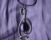 Silver coloured wire pendant