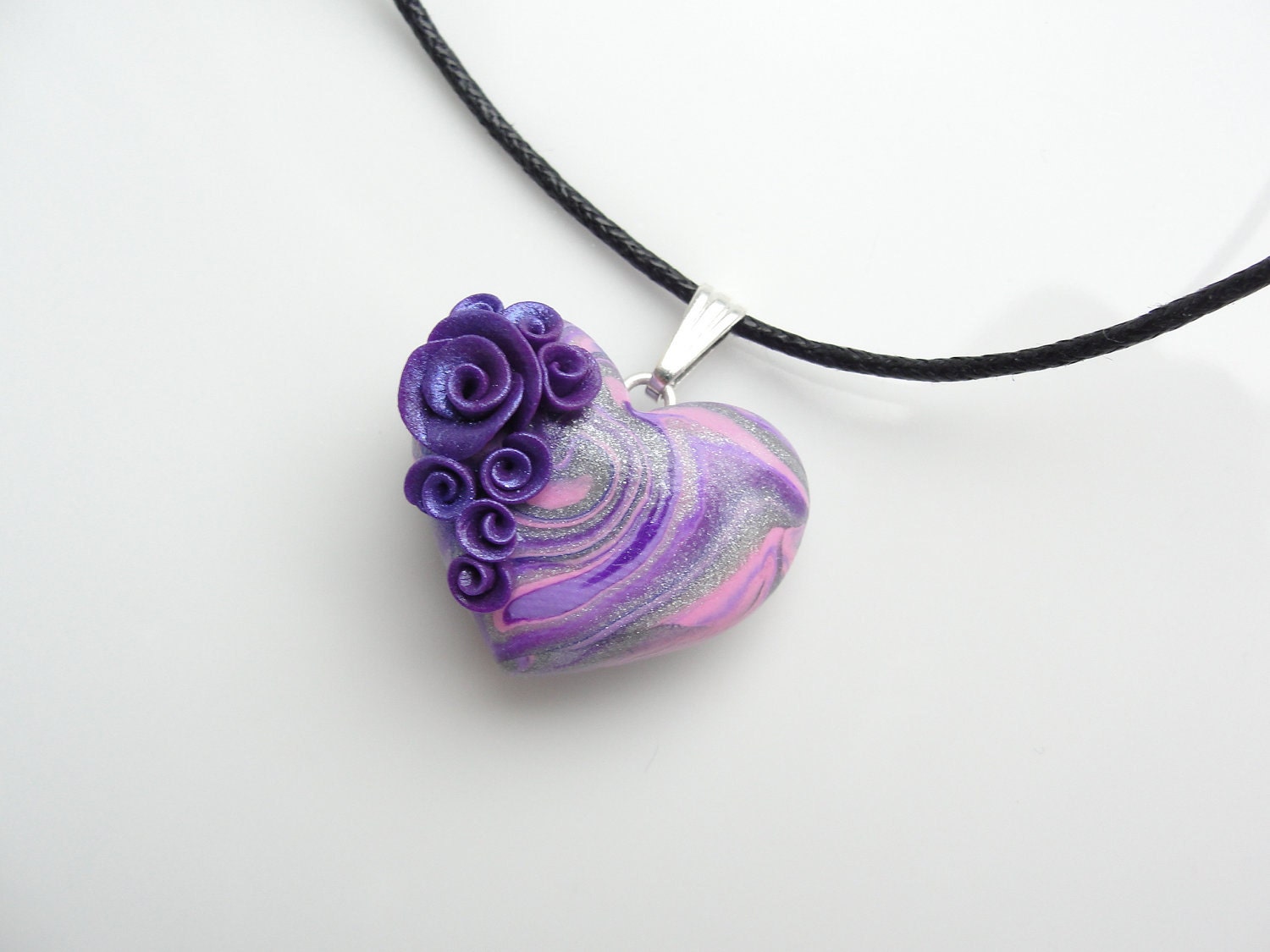 Heart pendant in pink, purple and silver with purple roses on black cotton cord necklace