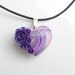 Heart pendant in pink, purple and silver with purple roses on black cotton cord necklace