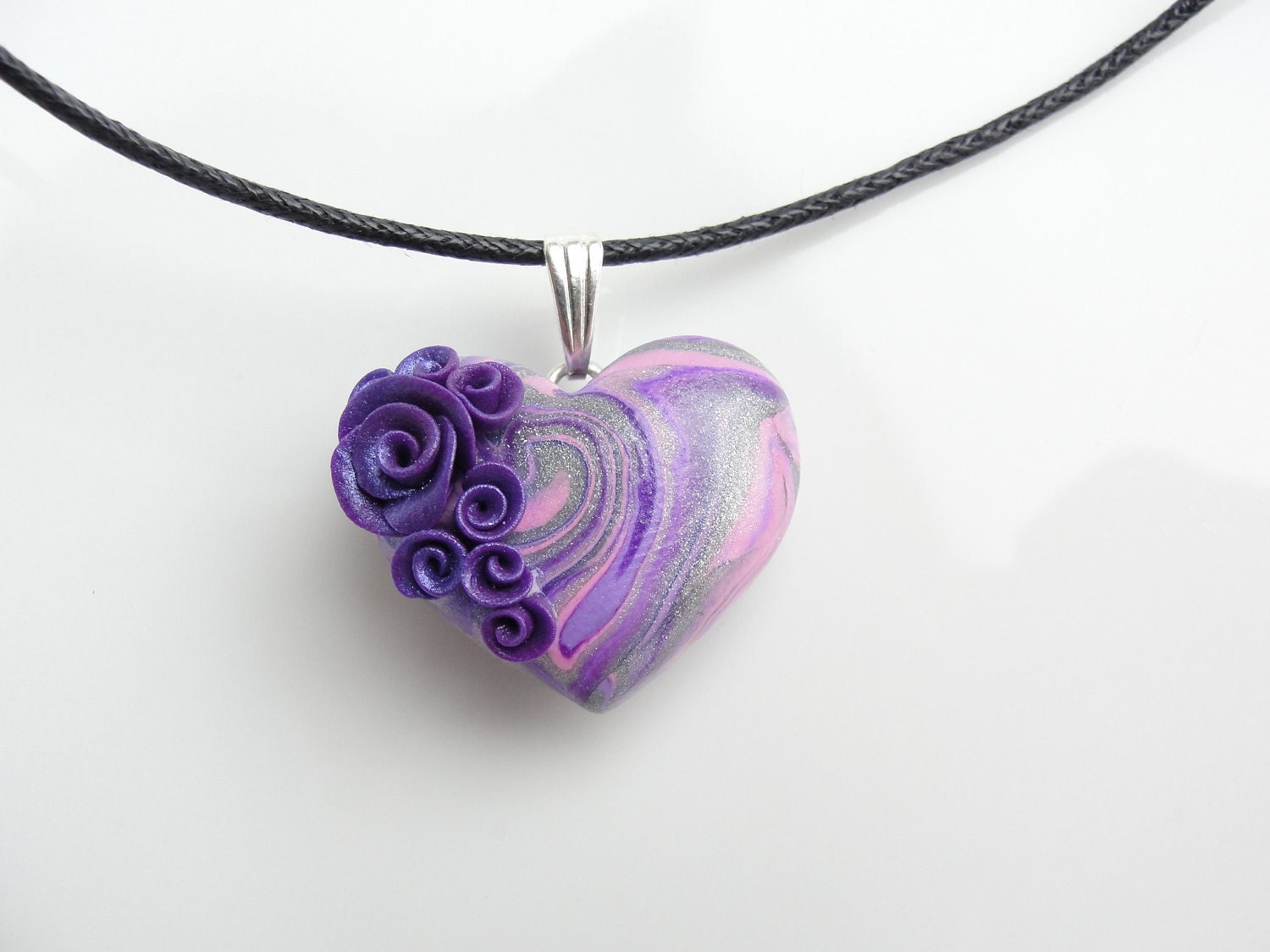 Heart pendant in pink, purple and silver with purple roses on black cotton cord necklace