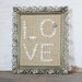 Buttons and Burlap in Vintage Weathered Filigree Frame - Love