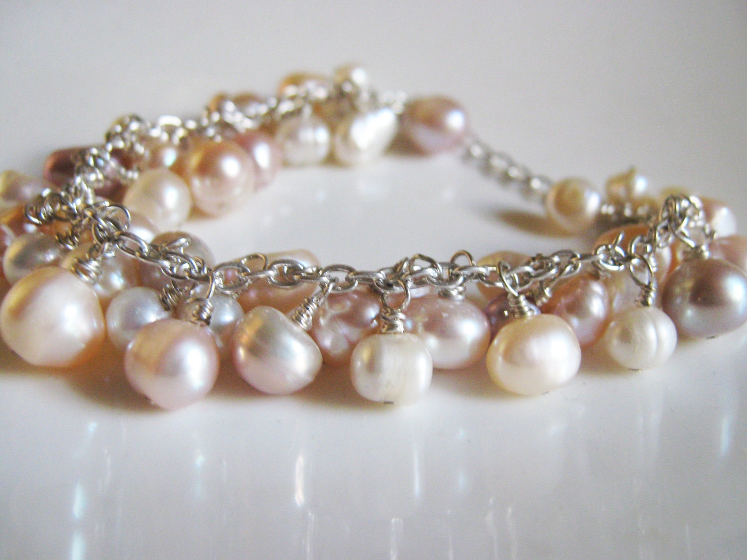 Freshwater Pearl Cluster Bracelet in Peach, white, cream, and mauve