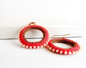 Red hoop peyote stitch earrings. White bronze geometric  round shapes. Seed beads jewelry