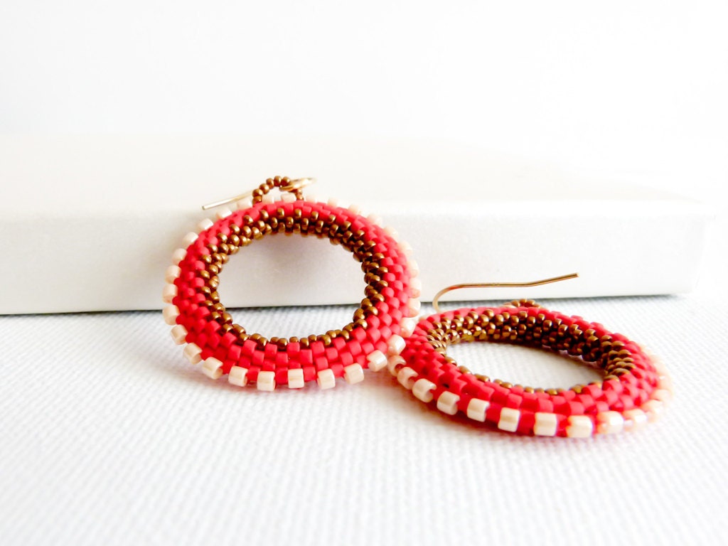 Red hoop peyote stitch earrings. White bronze geometric round shapes. Seed beads jewelry