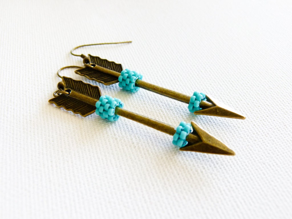 Tribal arrow earrings. Hanger games jewelry Turquoise antique bronze long dangle