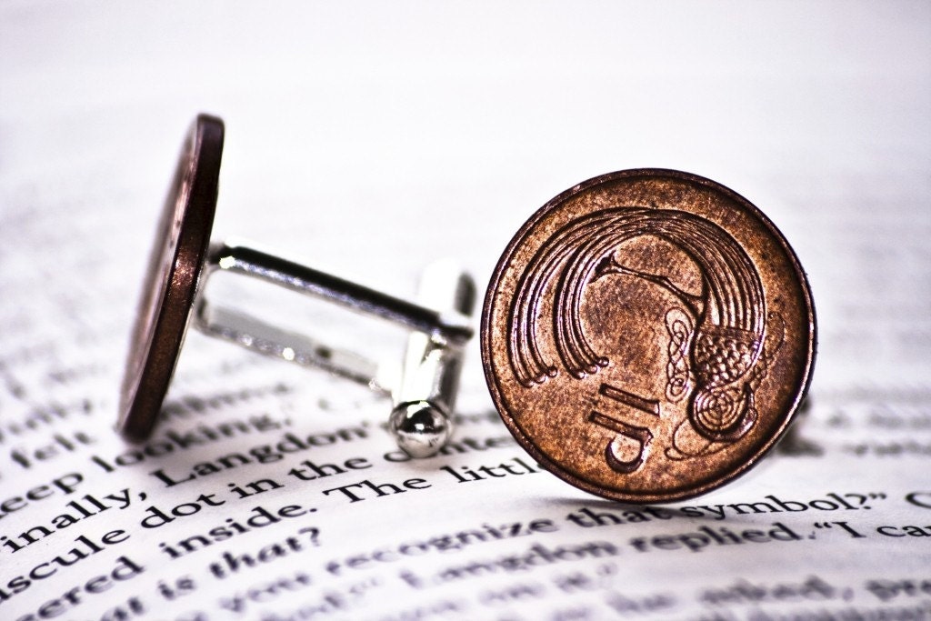 Cufflinks. Penny for your thoughts.