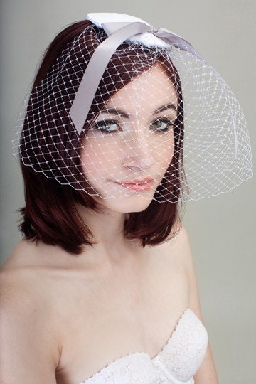 Bridal fascinator with French veiling