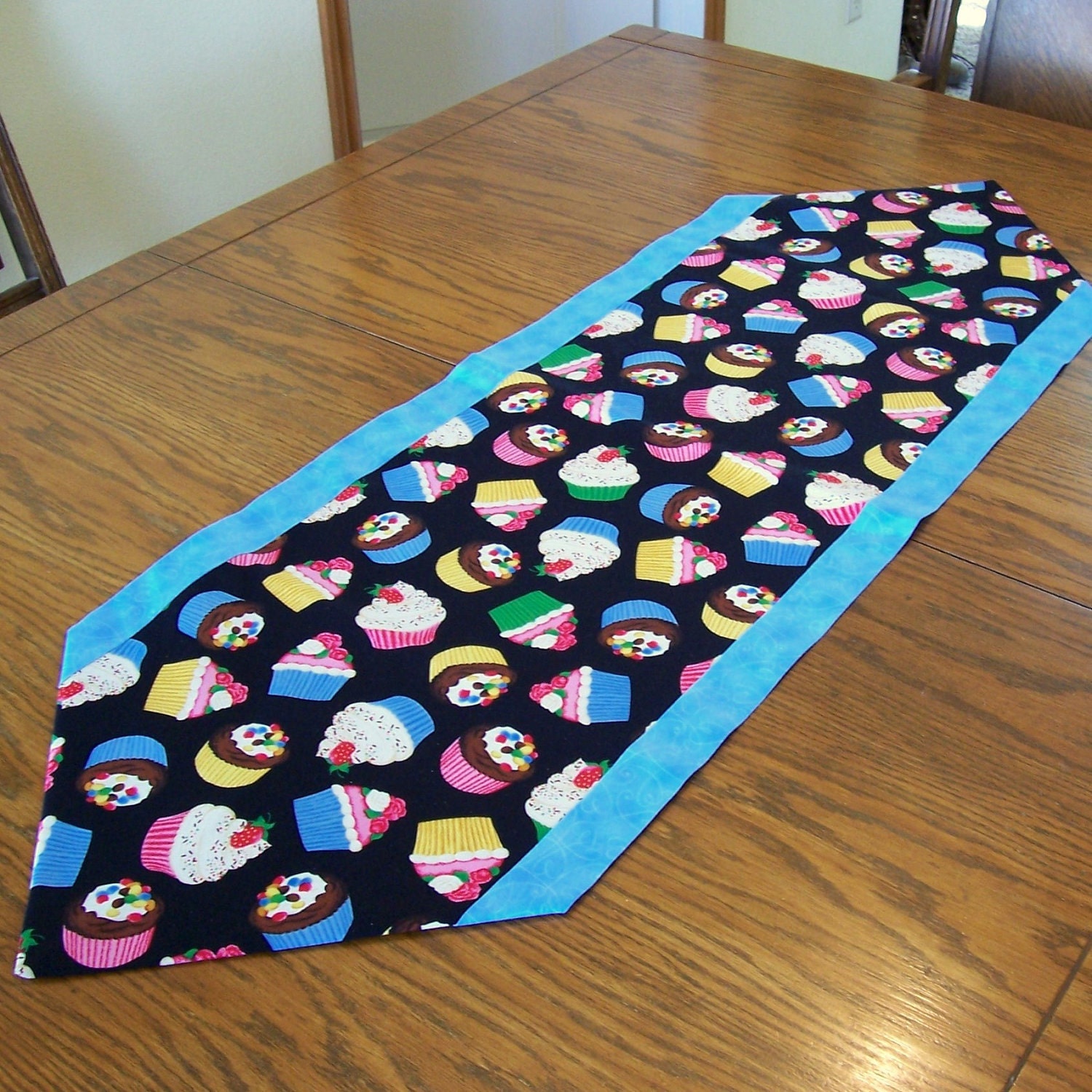 Cupcake Table Runner in Blue and Black with Various Colored Cupcakes