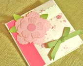 pink floral mini scrapbook album with paper rose and green bow