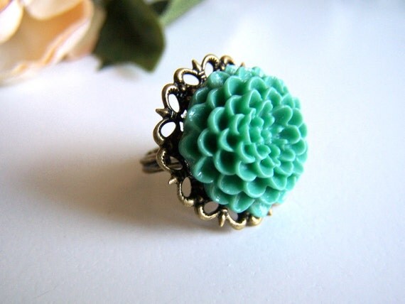 the teal daphne ring.