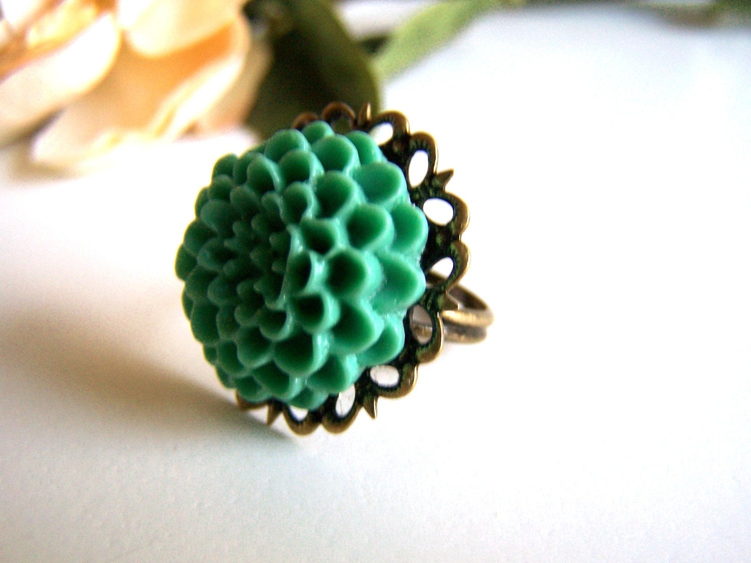 the teal daphne ring.