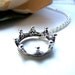 the crown necklace.