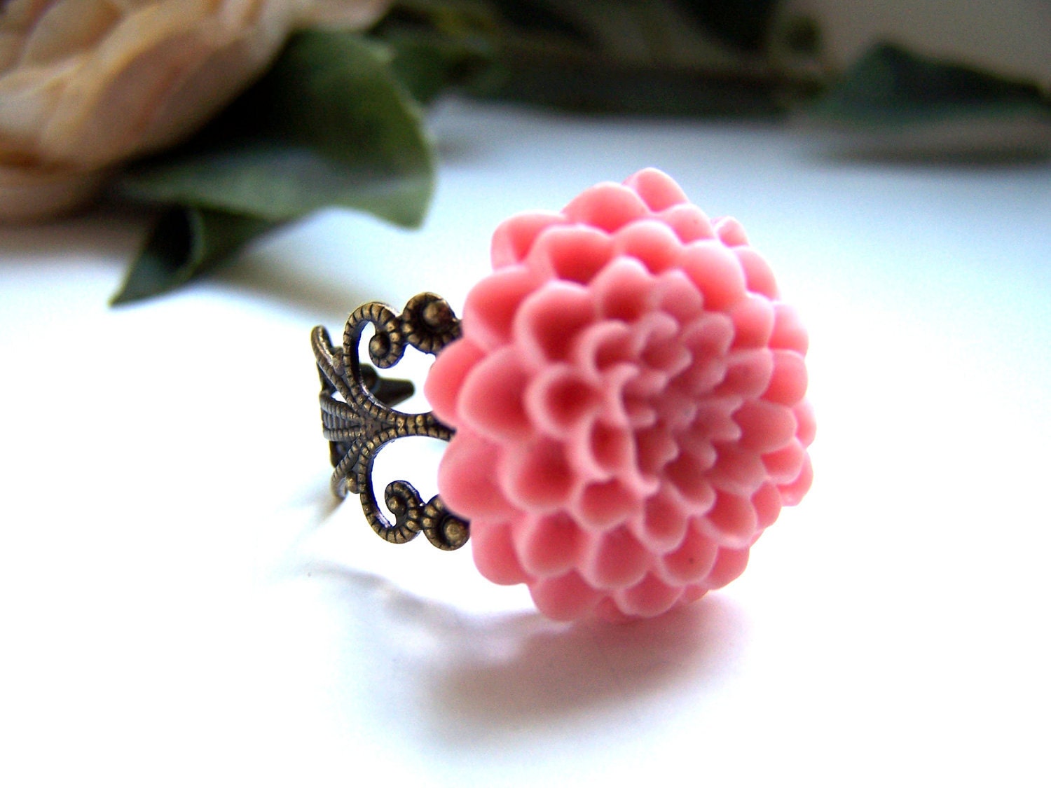 the pink floral ring.