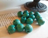 Half-strand of turquoise wood beads