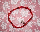 Red Feathers Single Loop Bracelet