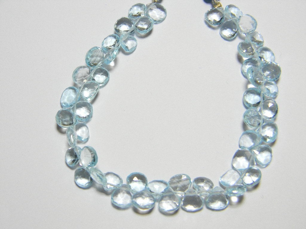 AAA Quality Sky Blue Topaz Faceted Heart Briolettes 7 inch strand 7 mm approx