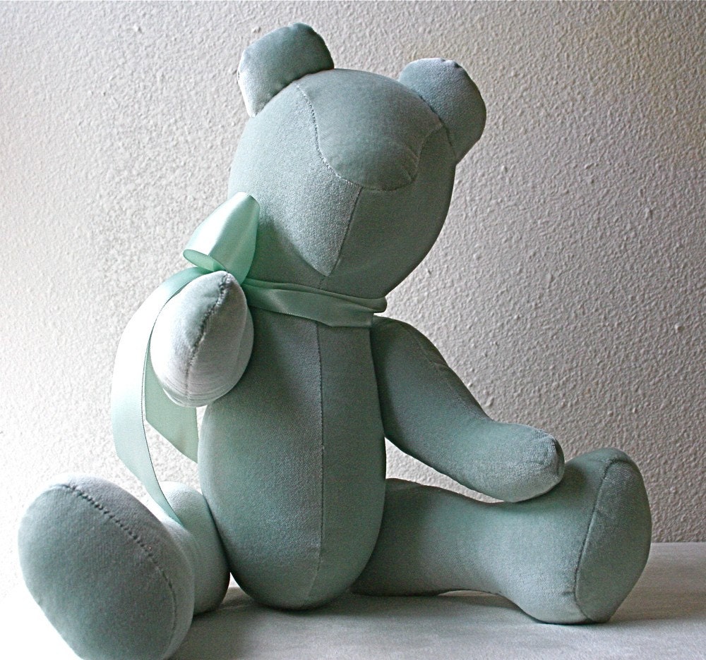Eloise the fabulous, velveteen, jointed bear.