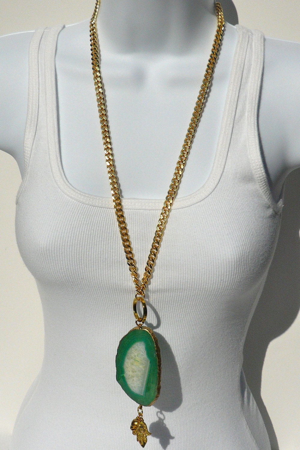 Chunky gold chain link necklace with green agate & gold charms