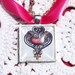 Elegant Bouquet Charms doubles as a necklace, Heart Design