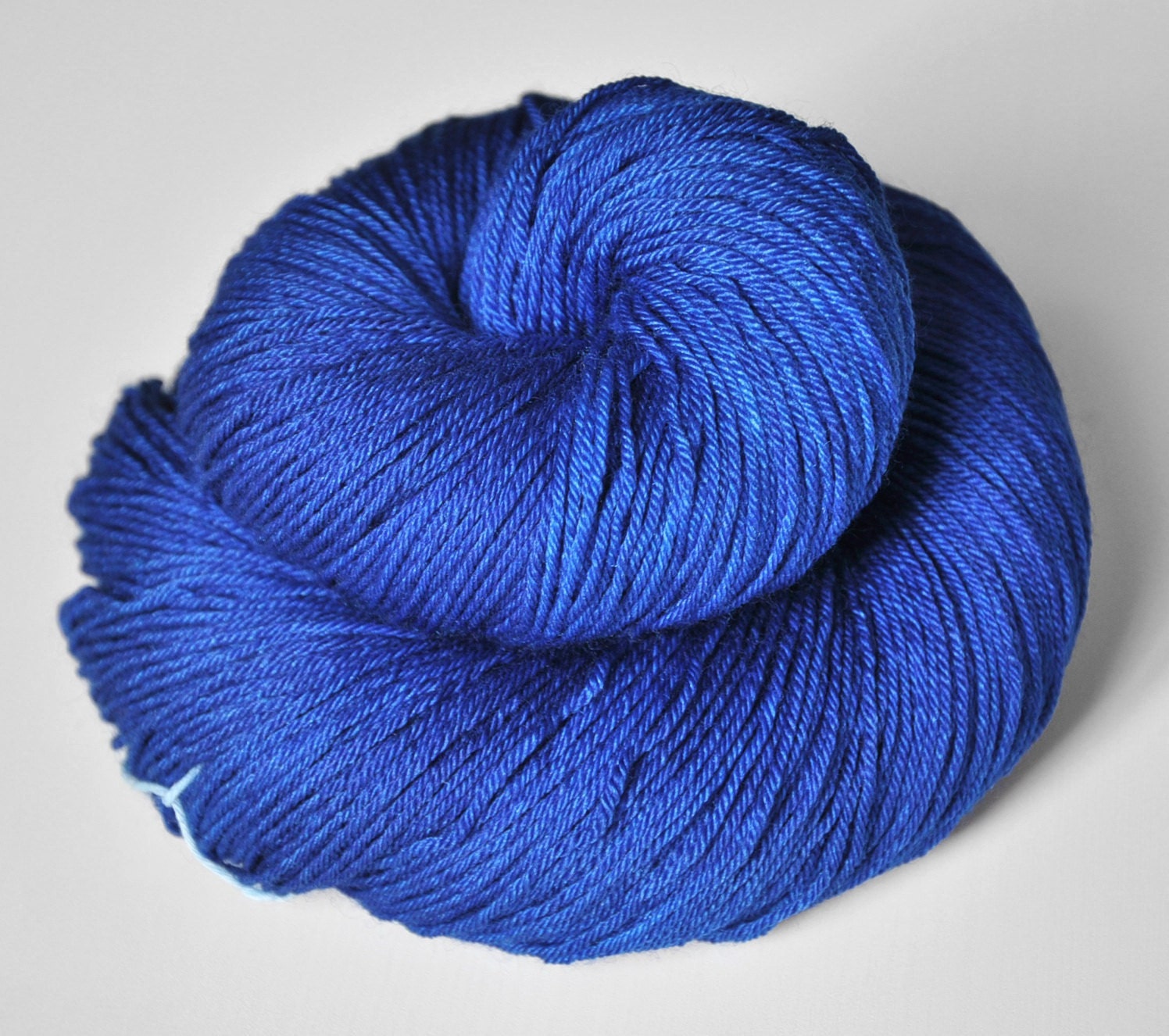 Completely shattered cobalt glass - Merino/Silk superwash yarn fingering weight
