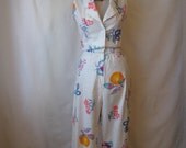 1980s jumpsuit. fruit print pants jumper. vintage 50s pin up girl style romper.