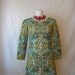 1960s dress. vintage mod medallion mini dress. 60s psychedelic shift.