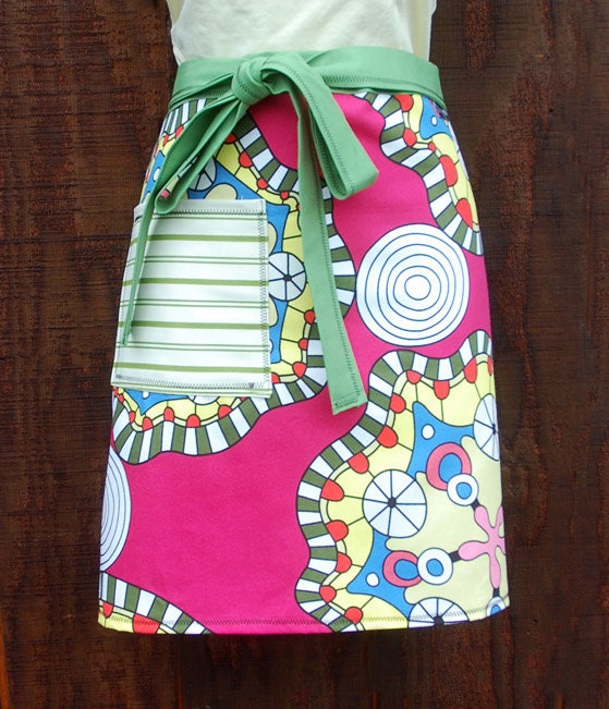 Bright pink apron, greens, yellow, modern design