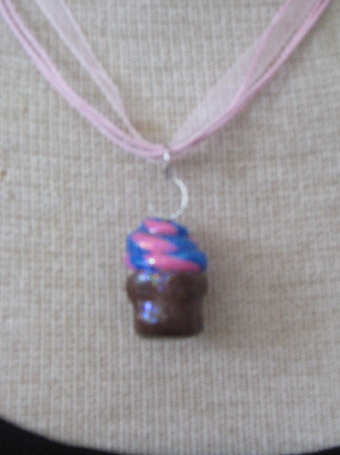 Cutie cupcake pendant / necklace made with polymer Clay pink and blue